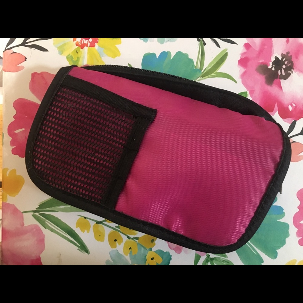 FREE with purchase: Studio Basics small cosmetic bag.